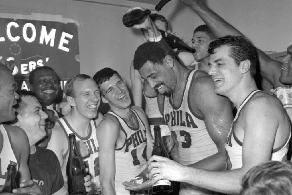 The Philadelphia 76ers celebrating after a game