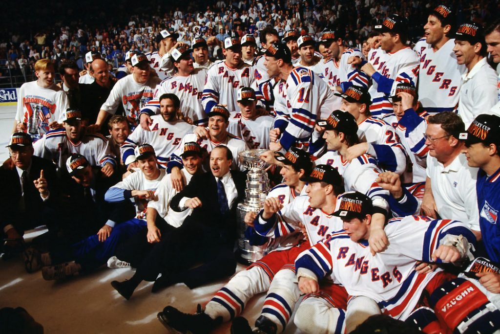 The 1994 New York Rangers celebrate with the Stanley Cup