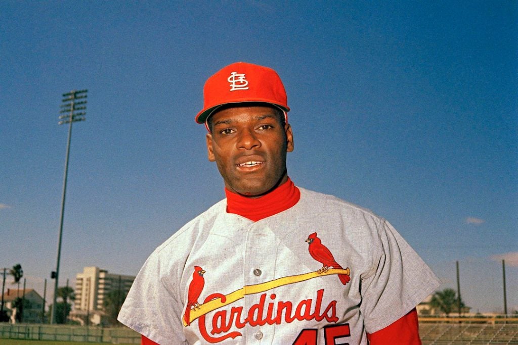 Bob Gibson wearing a St. Louis Cardinals jersey