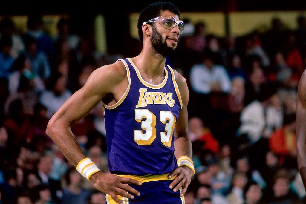 Kareem Abdul-Jabbar standing with his hands on his hips
