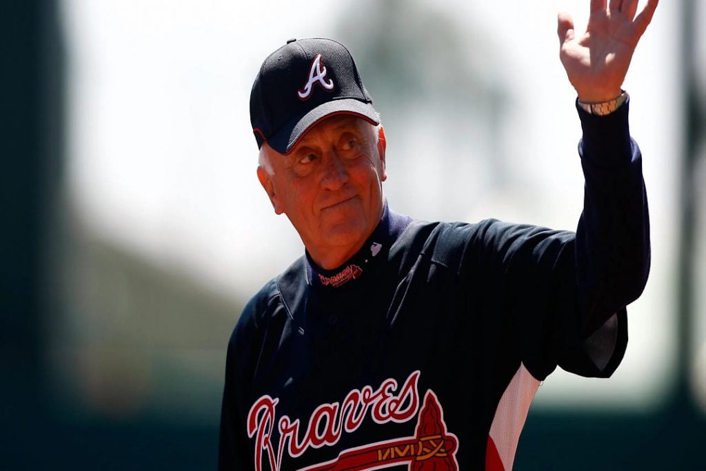 Phil Niekro waves to the crowd at an Atlanta Braves game
