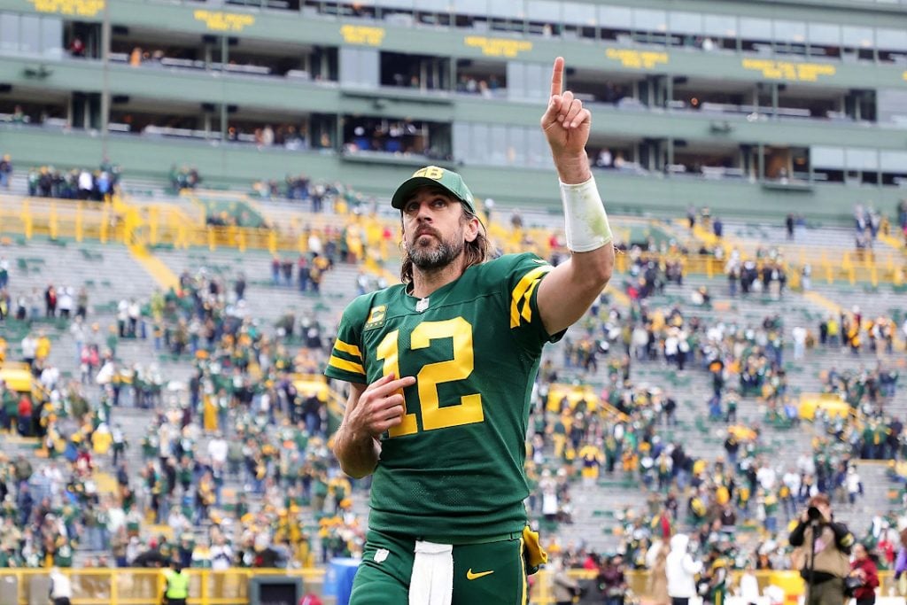 Aaron Rodgers pointing at the Green Bay Packers crowd