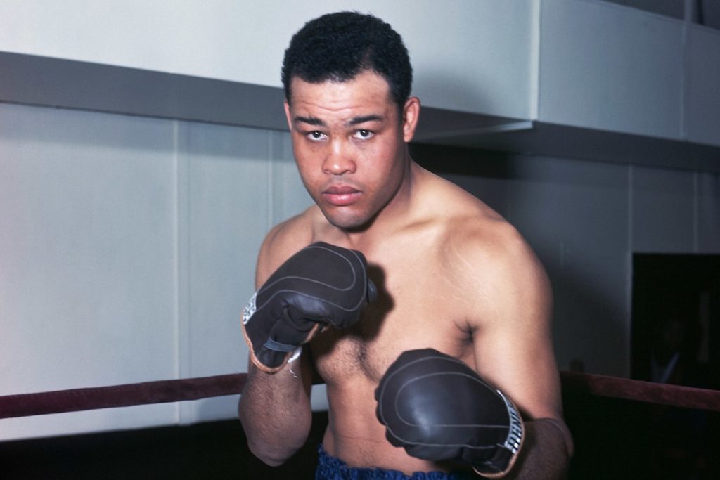 One of the best boxers ever, Joe Louis posing for the camera