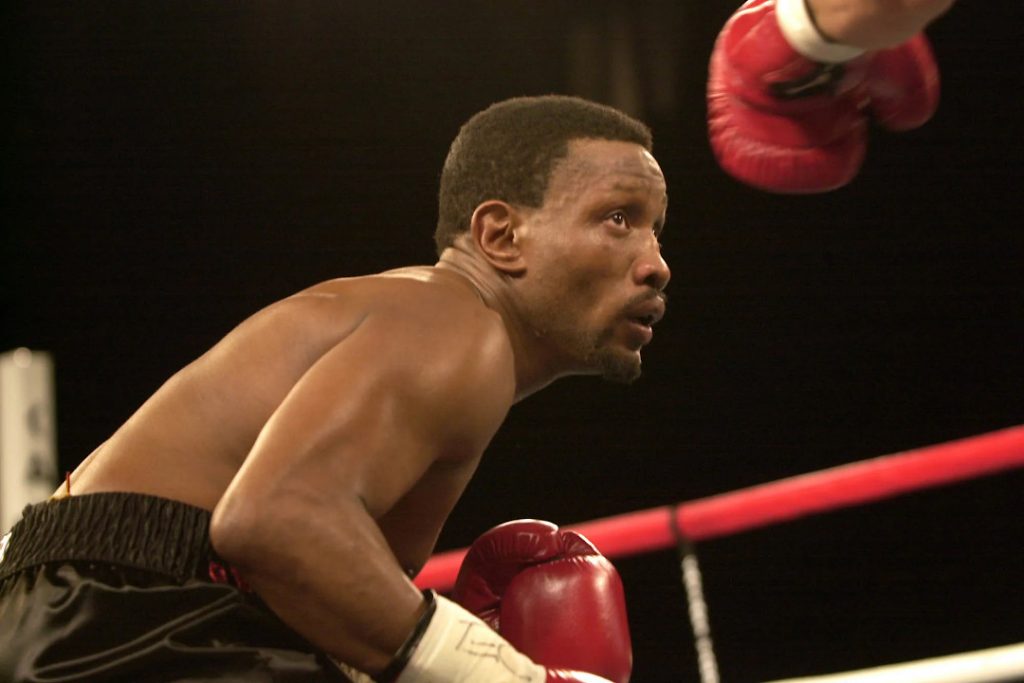 Pernell Whitaker weaving under a punch