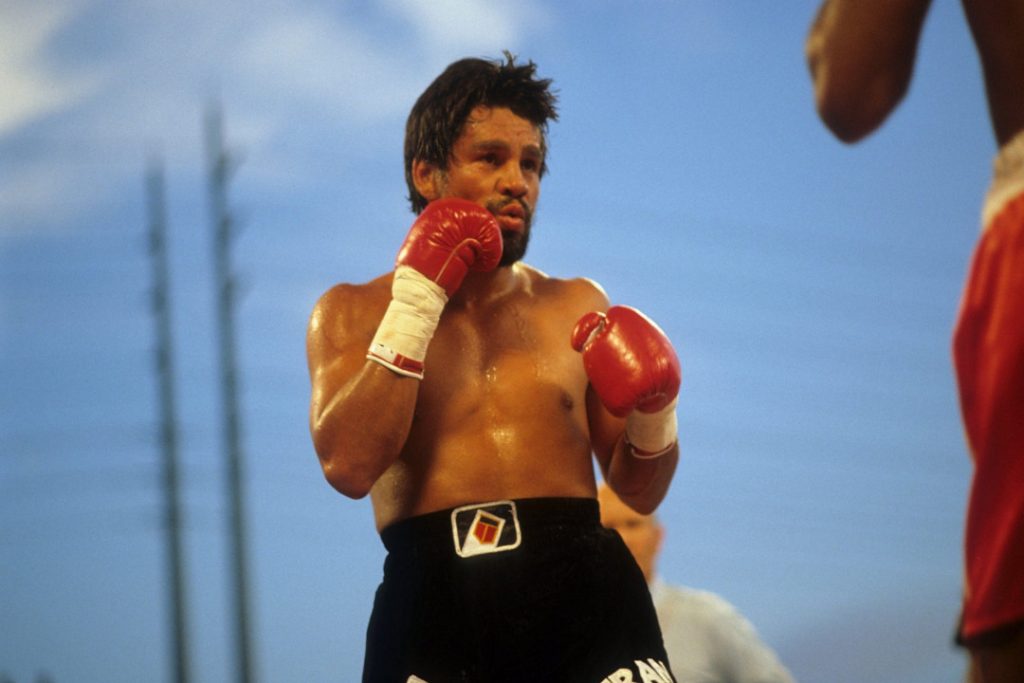 One of the best boxers of all time, Roberto Duran, fighting in black shorts