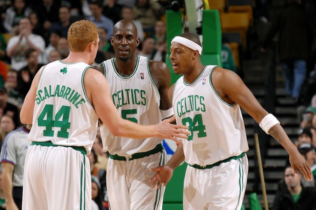 Brian Scalabrine high-fiving his teammates