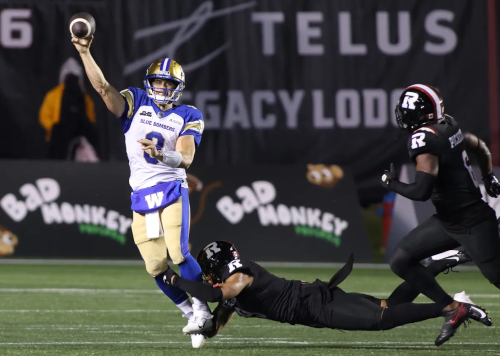 Zach Collaros avoids a sack for the Blue Bombers