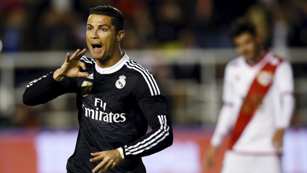 Cristiano Ronaldo celebrating in a Real Madrid kit