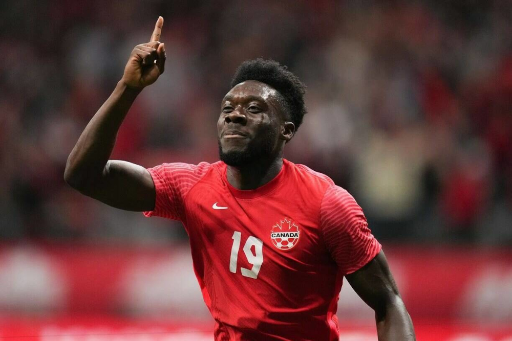 Alphonso Davies celebrates for Canada.